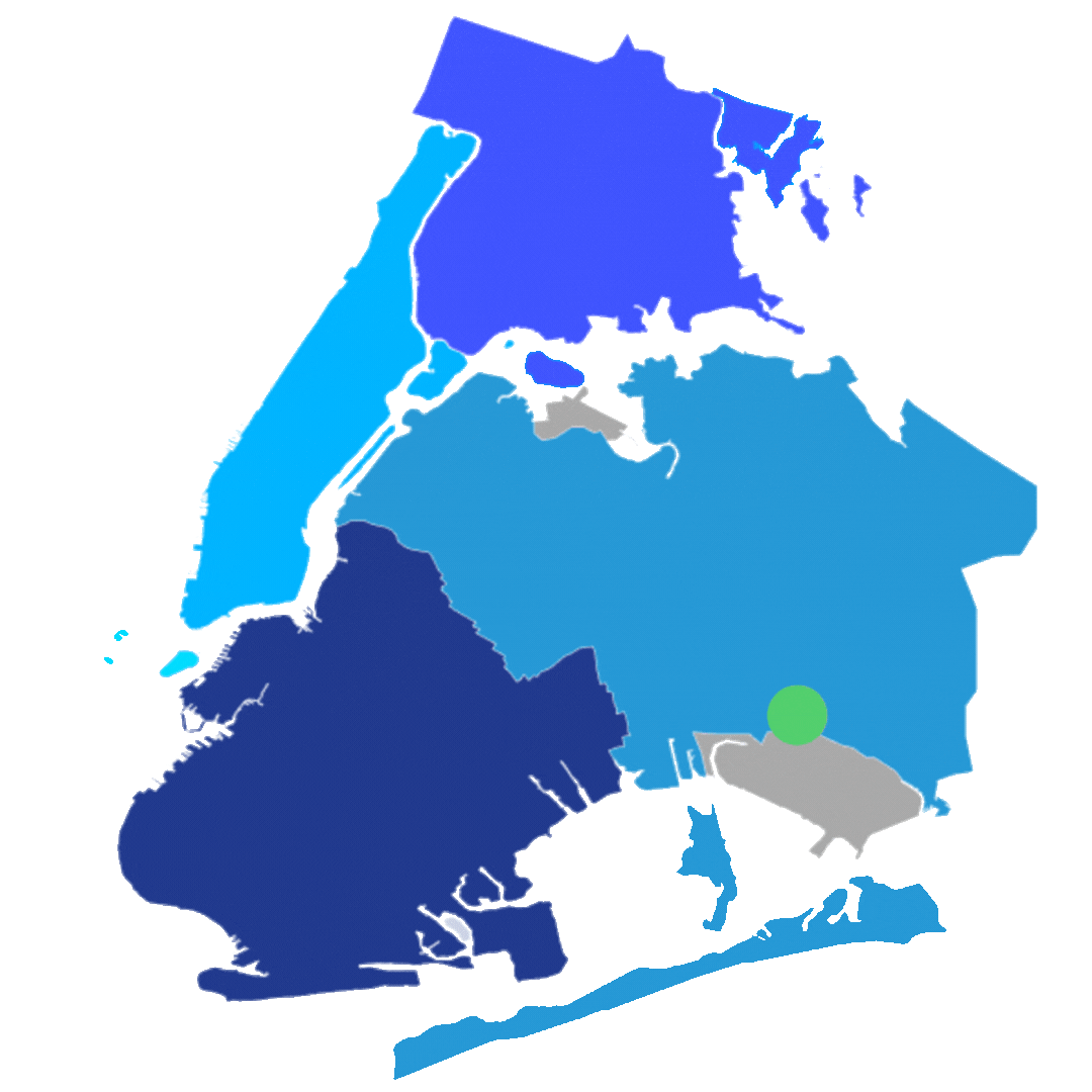 A color-coded map of New York City’s boroughs with a green dot marking a location in the southeastern part of Queens.